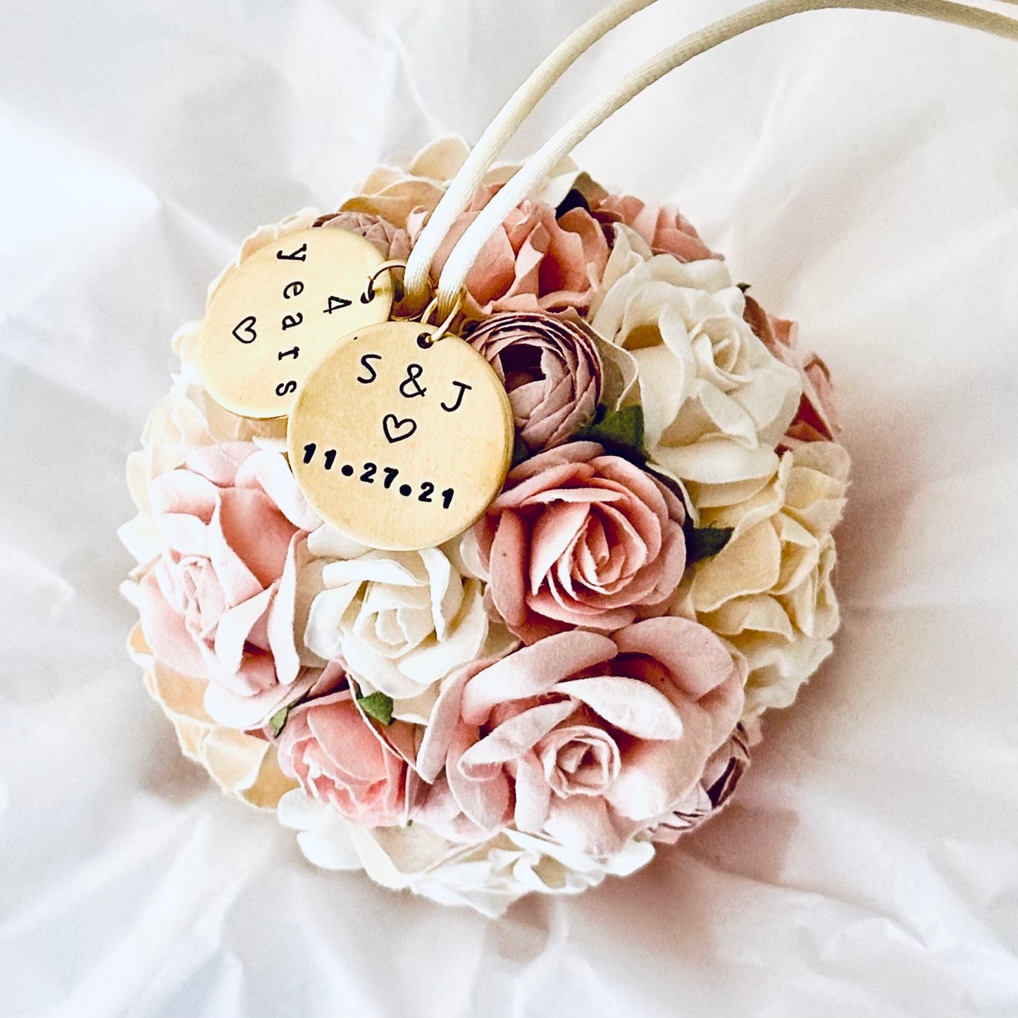 Flower 4th anniversary ornament with personalized gold charms on a white background.  The charms read "4 years" to celebrate 4th wedding anniversary, and a couples' initials and wedding date.