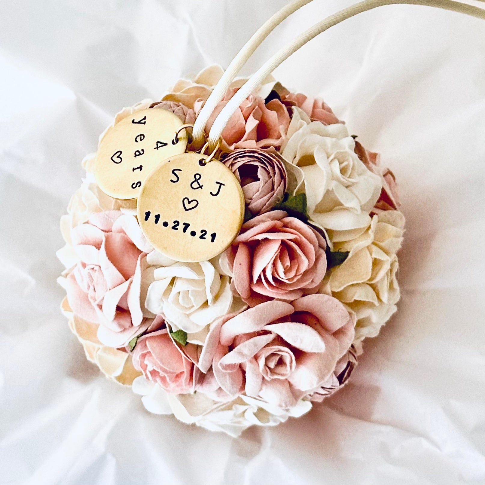 Flower 4th anniversary ornament with personalized gold charms on a white background.  The charms read "4 years" to celebrate 4th wedding anniversary, and a couples' initials and wedding date.